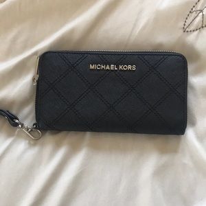 Michael Kors Jet Set travel clutch